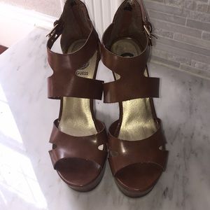 Gently used Guess brown platform wedges size 7
